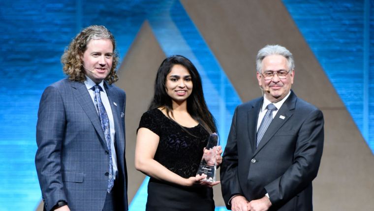 Deeksha Shetty was presented with the global award at the Alltech Young Scientist competition during ONE: The Alltech Ideas Conference (ONE19) by Dr. Mark Lyons and Dr. Karl Dawson.