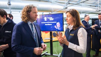 ​Co-founder of the ag-tech startup Breedr, Claire Lewis, speaks with Dr. Mark Lyons, president and CEO of Alltech, during the first day of The Pearse Lyons Accelerator 2019 program at Dogpatch Labs in Dublin, Ireland.