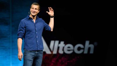 Bear Grylls speaks to the crowd from the main stage at ONE19: The Alltech Ideas Conference